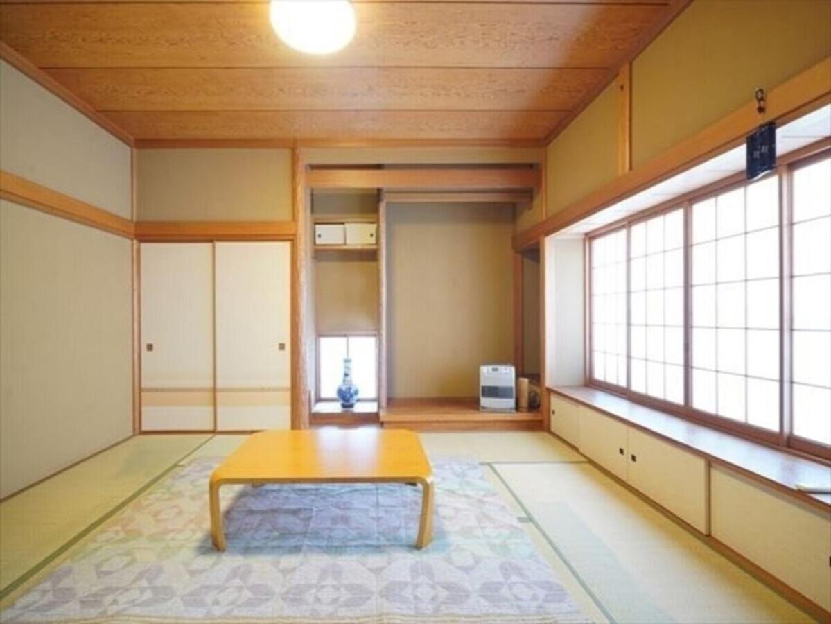 海と駅の近くのゲストハウス海悠 Itō Extérieur photo
